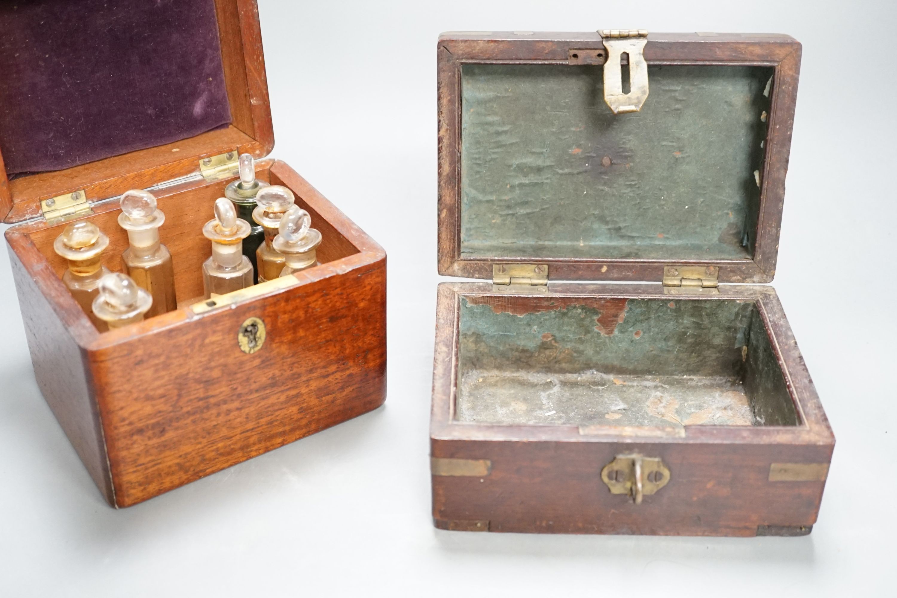 A Victorian mahogany medicine case, with bottles, 13cm. wide, a brass-mounted box and a rosewood veneered pen box
